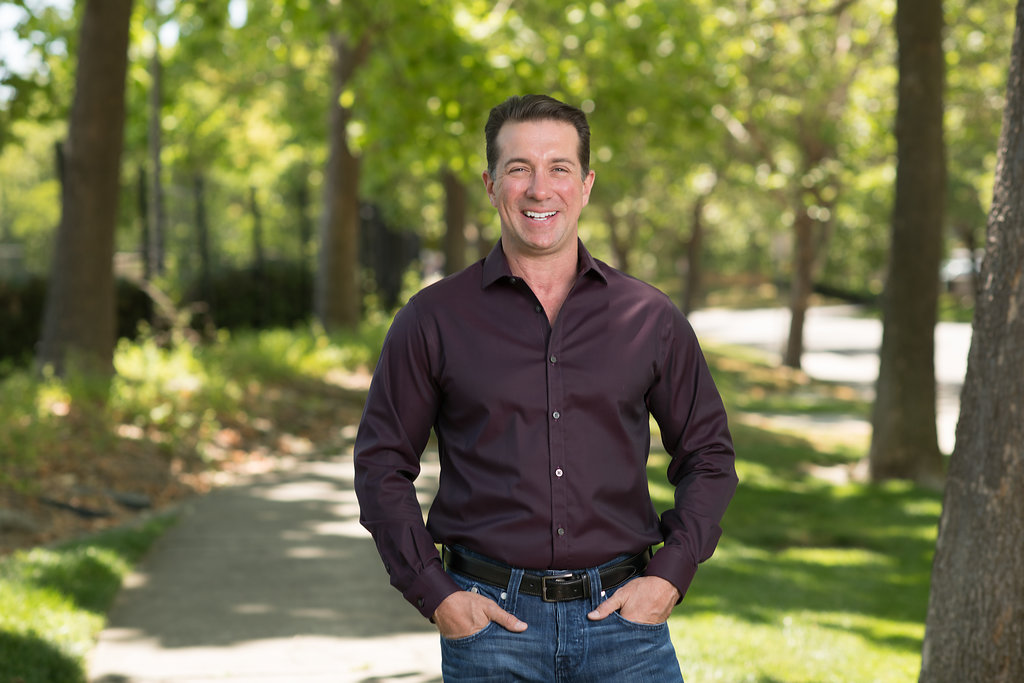 Brandon Frere on a tree-lined path in Northern California