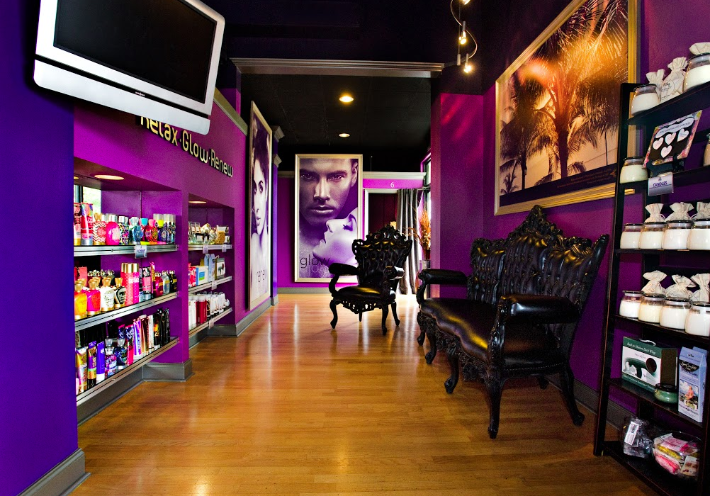 Interior of a wellness franchise studio with retail display and lounge seating