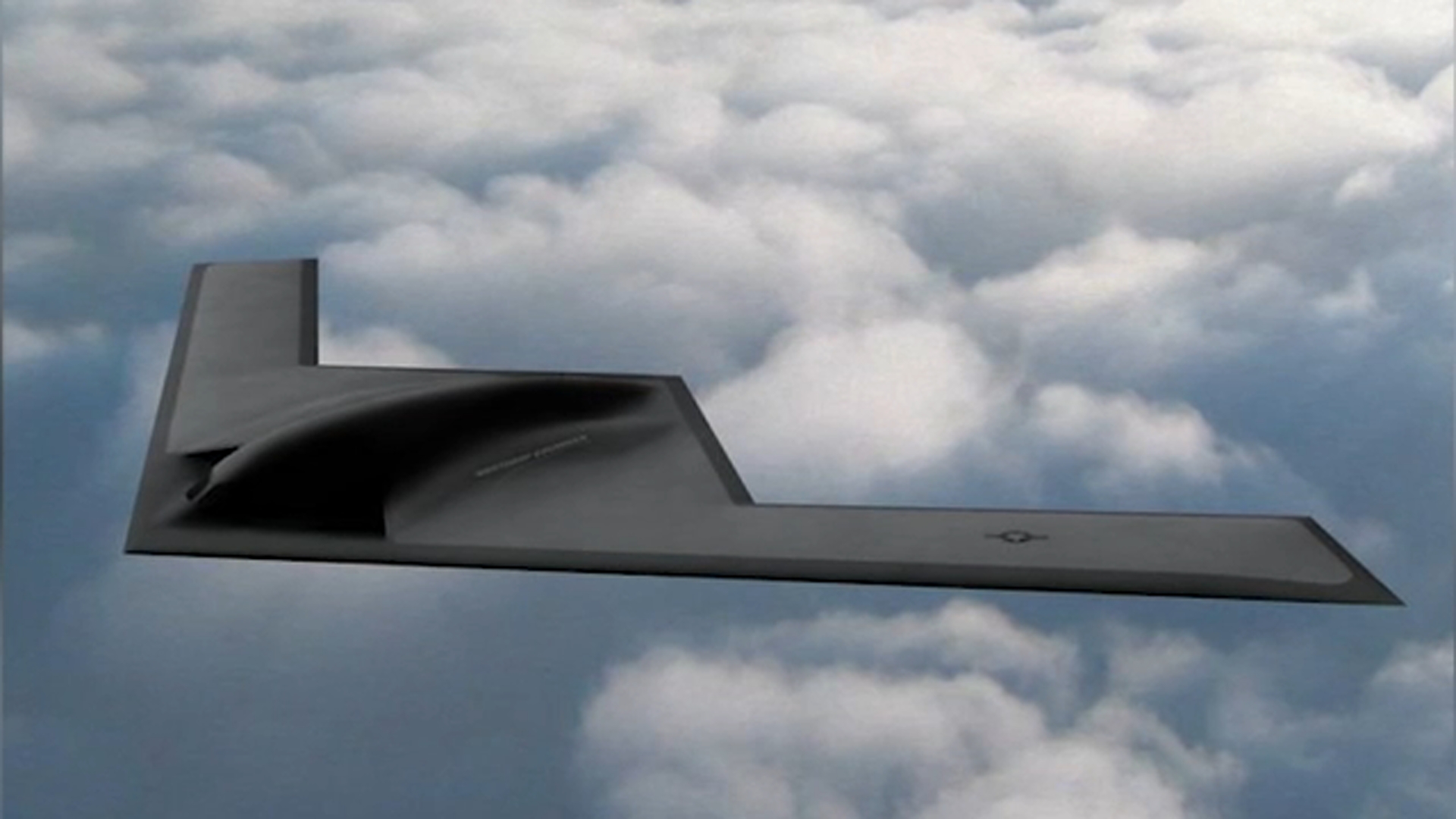 An advanced flying-wing aircraft above a cloud layer